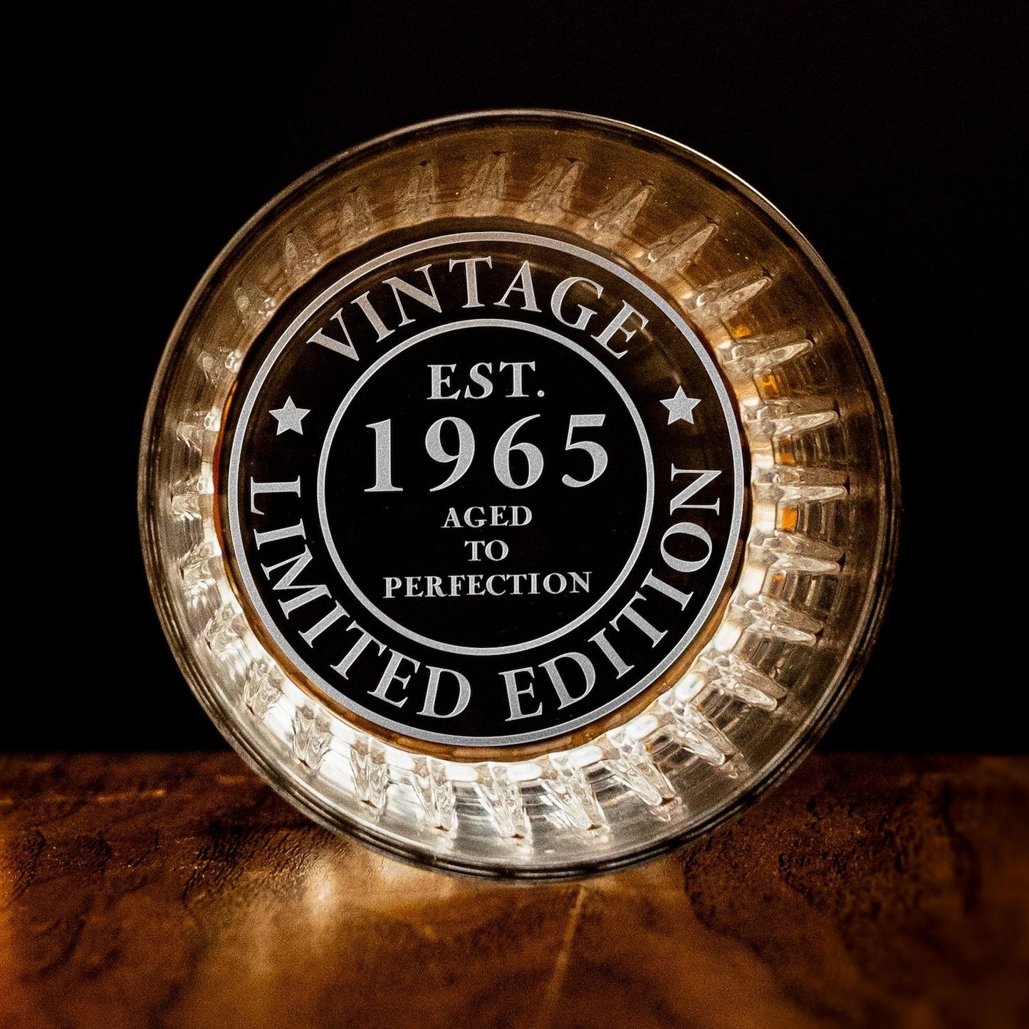 Engraved custom whiskey glass with 'Vintage 1965' and 'Limited Edition' design.