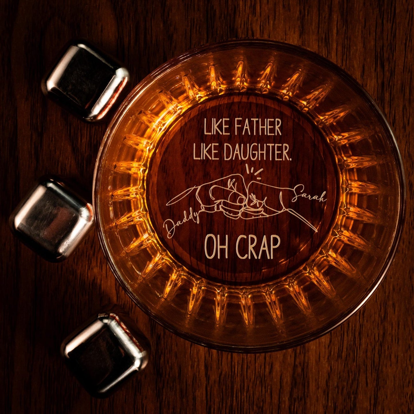Custom engraved whiskey glass with 'Like Father Like Daughter' and hand-drawn design.