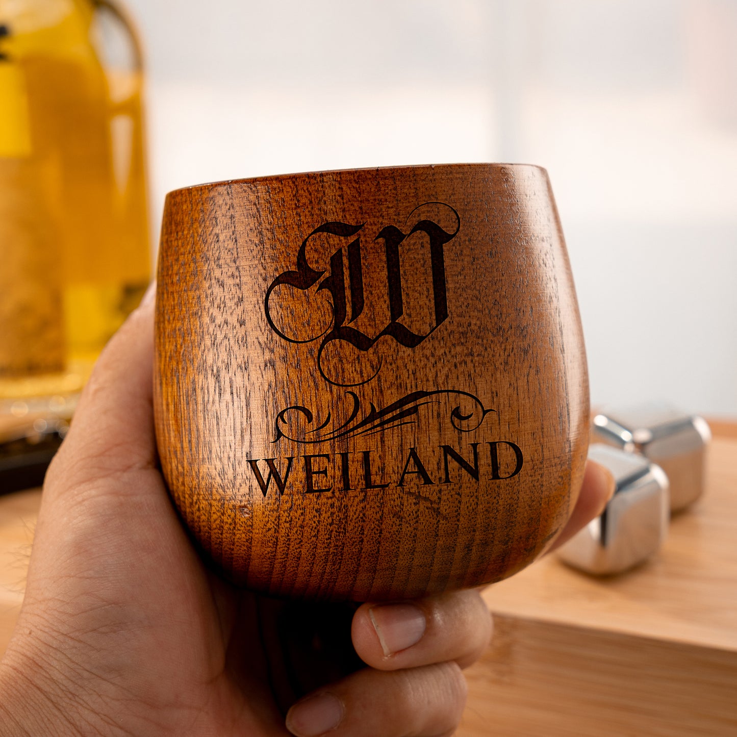 Custom whiskey glass personalized with engraved name Weiland and monogram design.