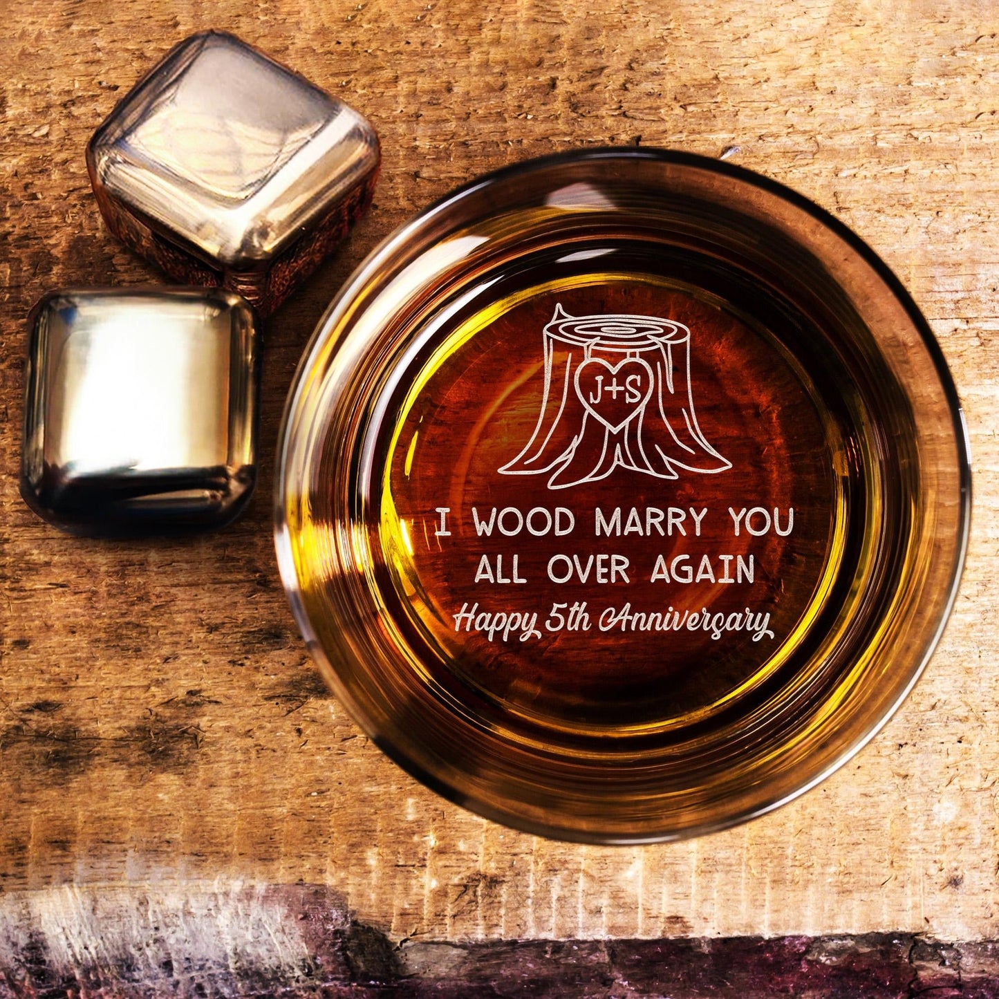 Personalized whiskey glass for 5 year anniversary celebration with heartfelt wood-themed quote