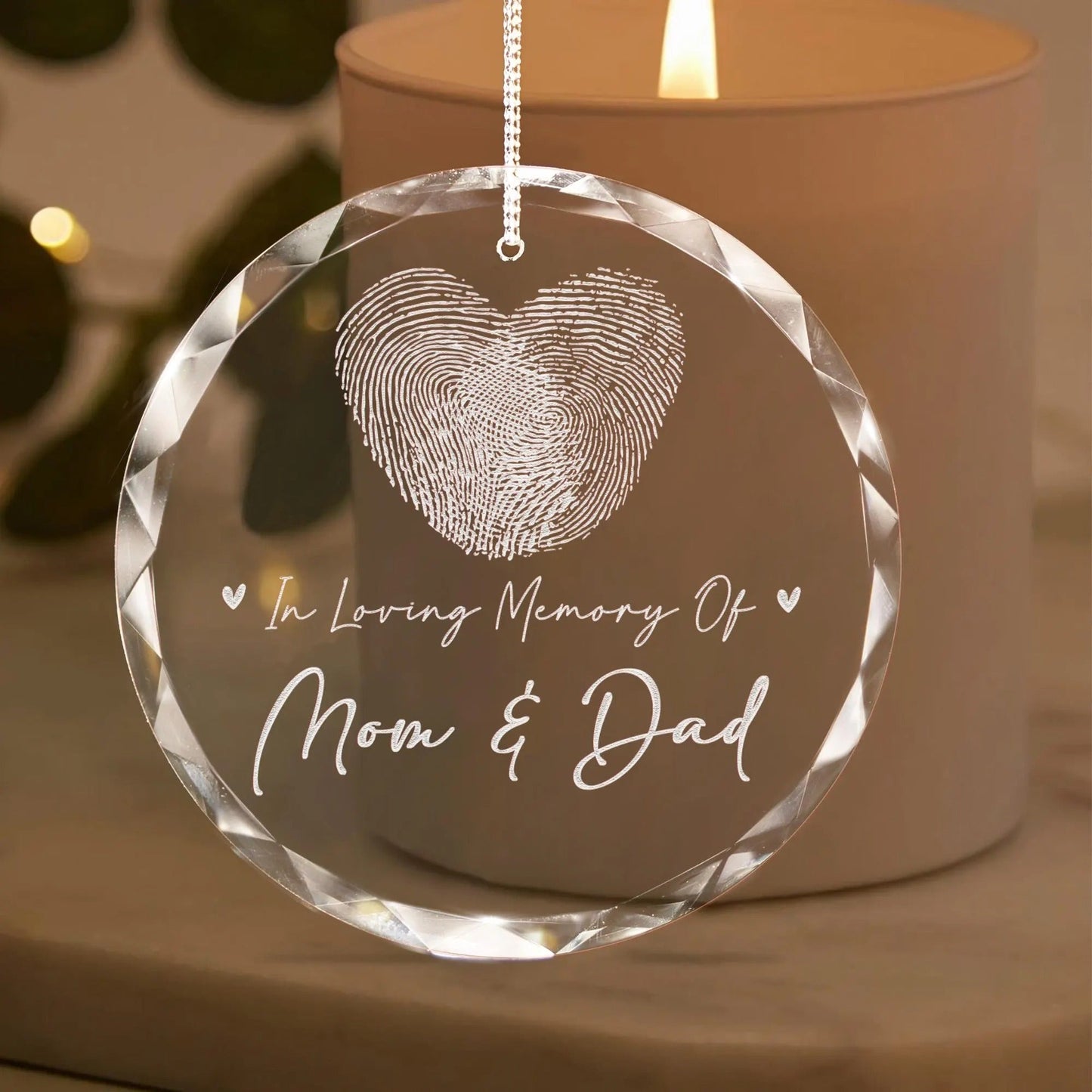 Memorial ornaments designed with fingerprint and custom name to honor a lost loved one