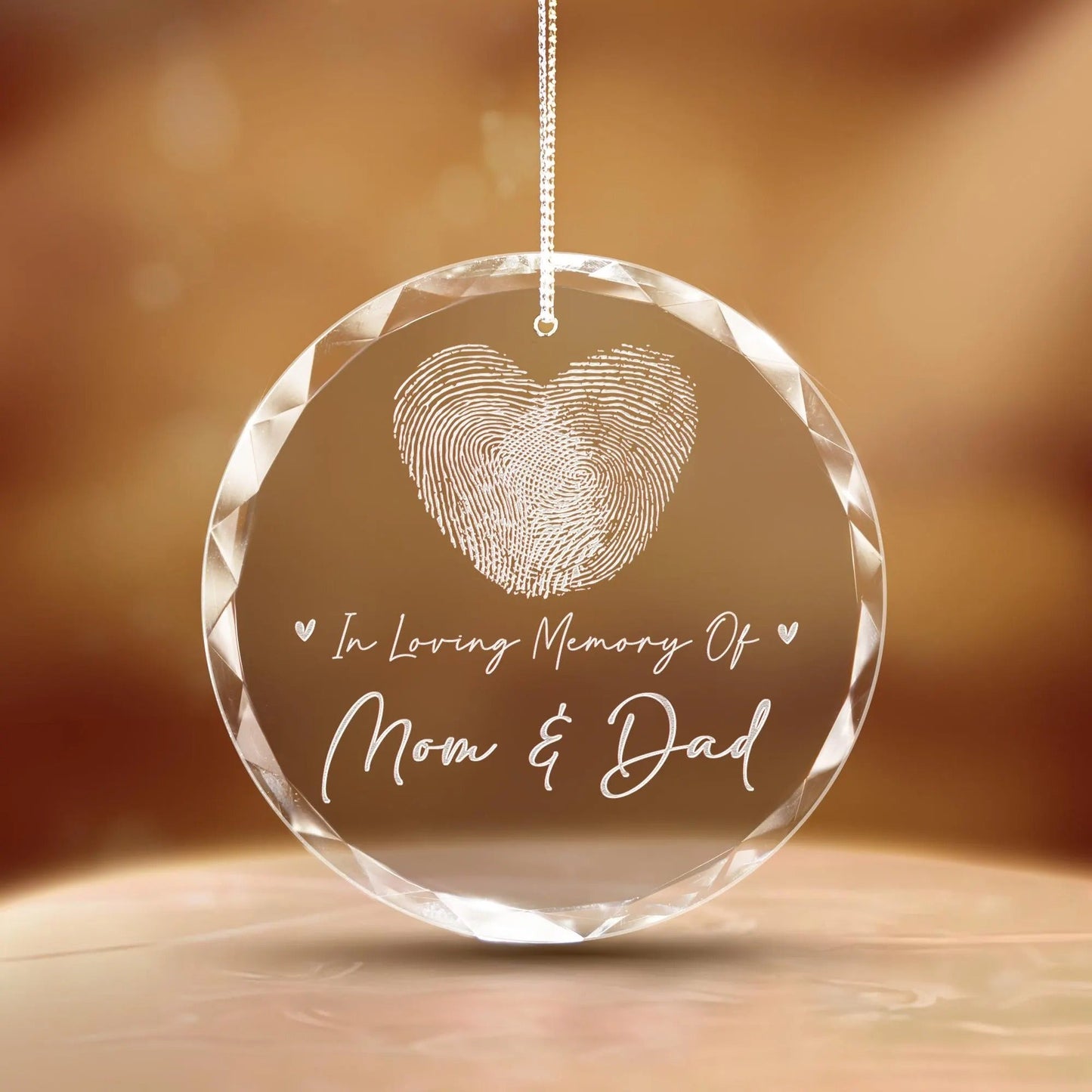 Gifts for those who lost a loved one like fingerprint glass ornaments with heartfelt detail