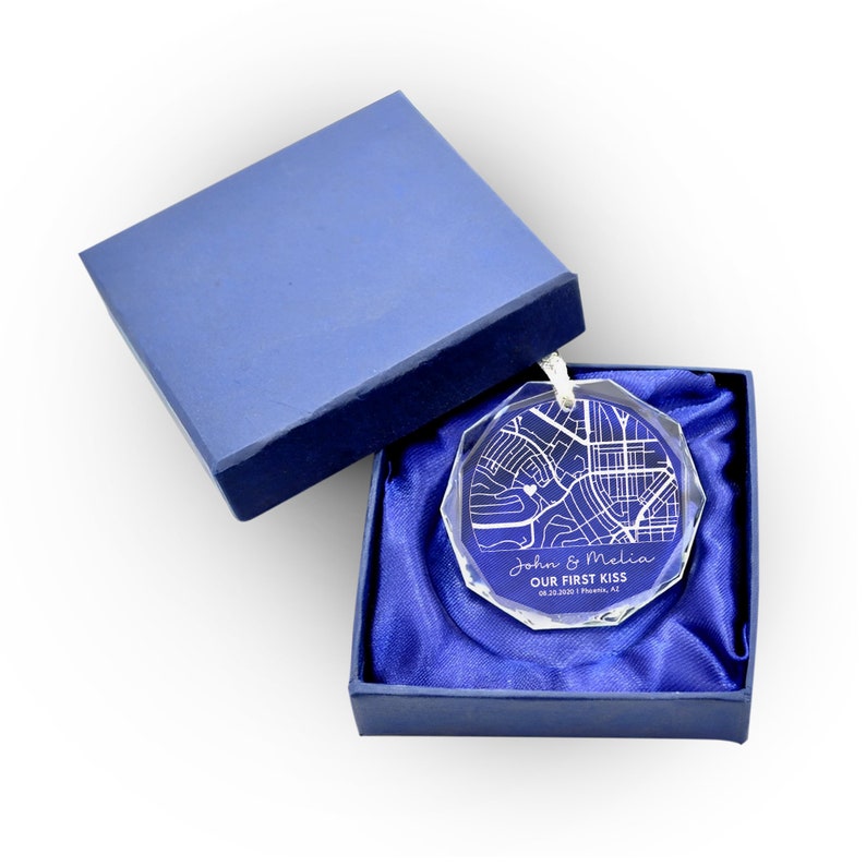 Charming Personalized Map Glass Ornament for Couple presented as a thoughtful first anniversary gift