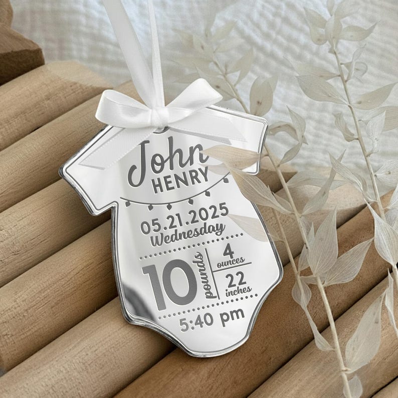 The perfect first Christmas ornament, this Personalized Newborn Birth Stats Acrylic Ornament is a custom engraved Christmas ornament.