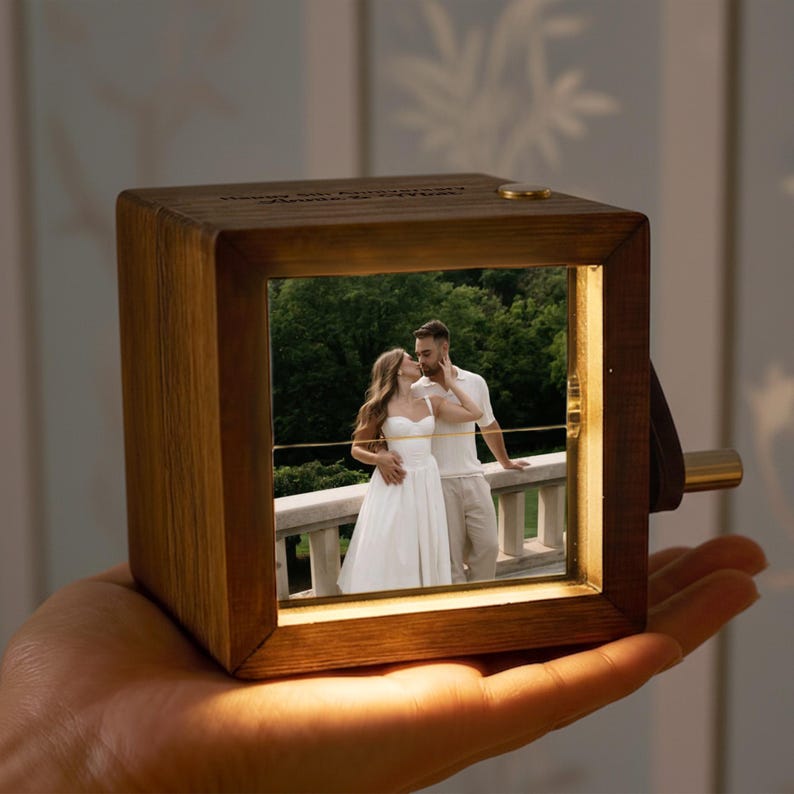 A unique custom flipbook, the Personalized Photo Wooden Anniversary Flipbook with Light is a beautiful gift for her.