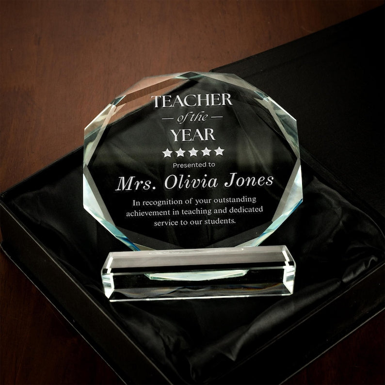 A custom Personalized Teacher of the Year Crystal Award, a unique teacher of the year gift idea to honor their dedication and hard work.