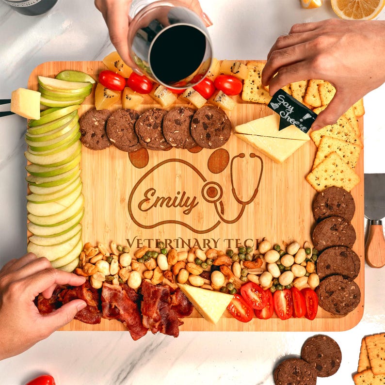 A complete Personalized Veterinary Tech Bamboo Charcuterie Board set with tools, an ideal personalized vet tech gift.
