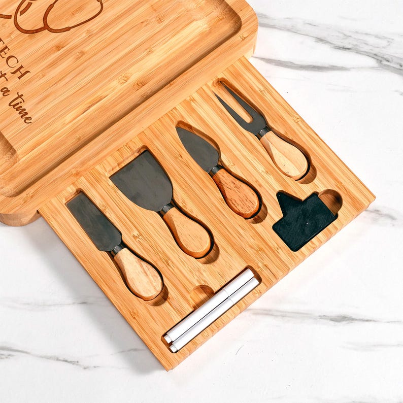 Close-up of the engraved details on a Personalized Veterinary Tech Bamboo Charcuterie Board, a special gift for veterinary technician week.