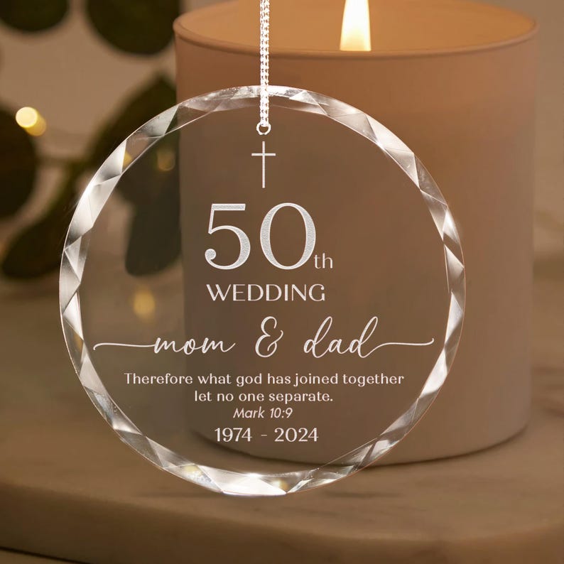 The perfect 50th wedding anniversary gift for parents, a custom Personalized Glass Ornament to celebrate their golden anniversary.