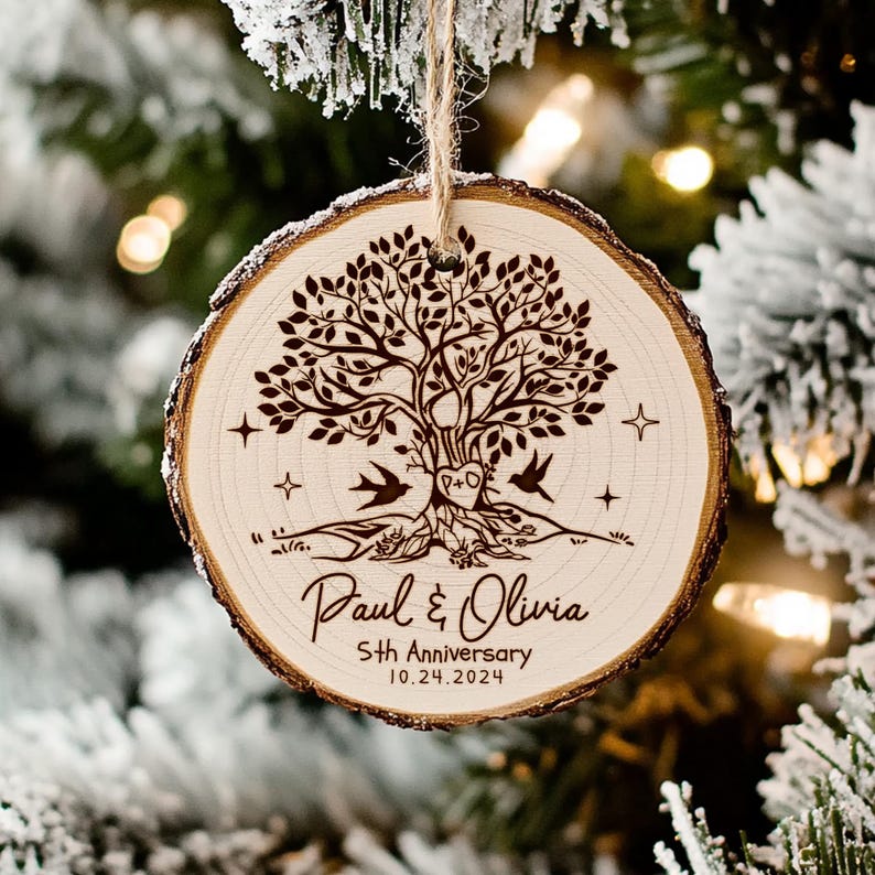 A close-up of an engraved Personalized 5th Anniversary Wooden Ornament, an ideal and romantic wood anniversary gift.