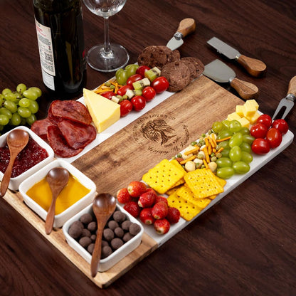 A Personalized 9 Year Anniversary Marble Charcuterie Board set, complete with engraved tools and knives.