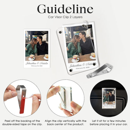 A close-up of an anime-style custom couple Pokemon card visor clip for unique car accessories gifts.