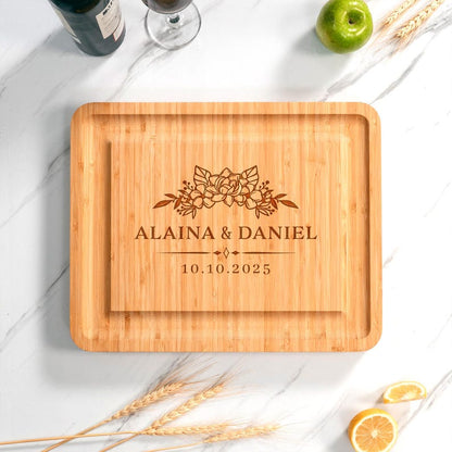 Close-up on the custom engraving of a Personalized Bamboo Wedding Charcuterie Board with Tools, a unique personalized cheese board gift set.
