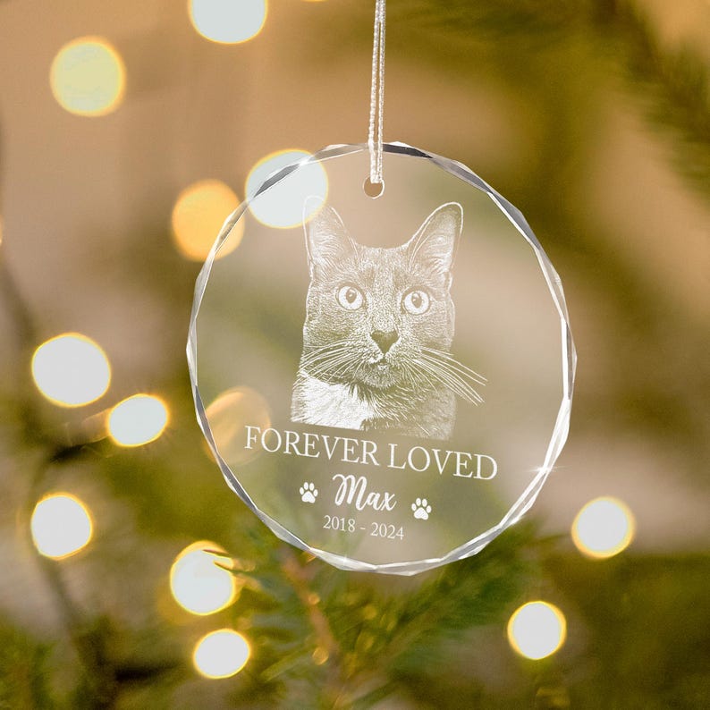 As an engraved Christmas ornament, the Personalized Cat Memorial Glass Ornament serves as a loving memorial for a beloved cat.