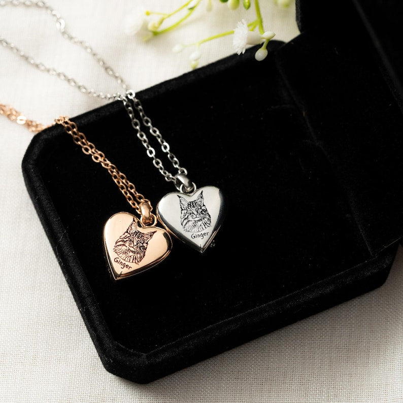 A custom personalized memorial necklace, the Personalized Cat Photo Heart Urn Necklace features a heart design for ashes.
