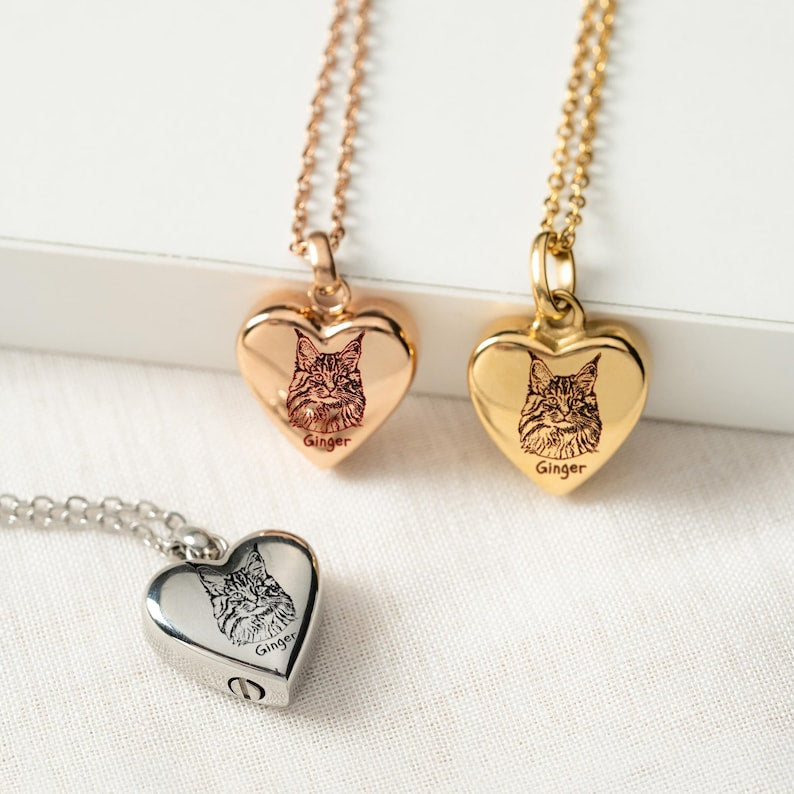 An elegant personalized urn necklace, the Personalized Cat Photo Heart Urn Necklace is a cherished memorial necklace.