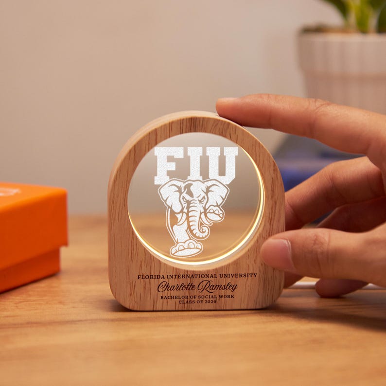 A premium university logo grad gift, serving as a lasting memento of academic success.