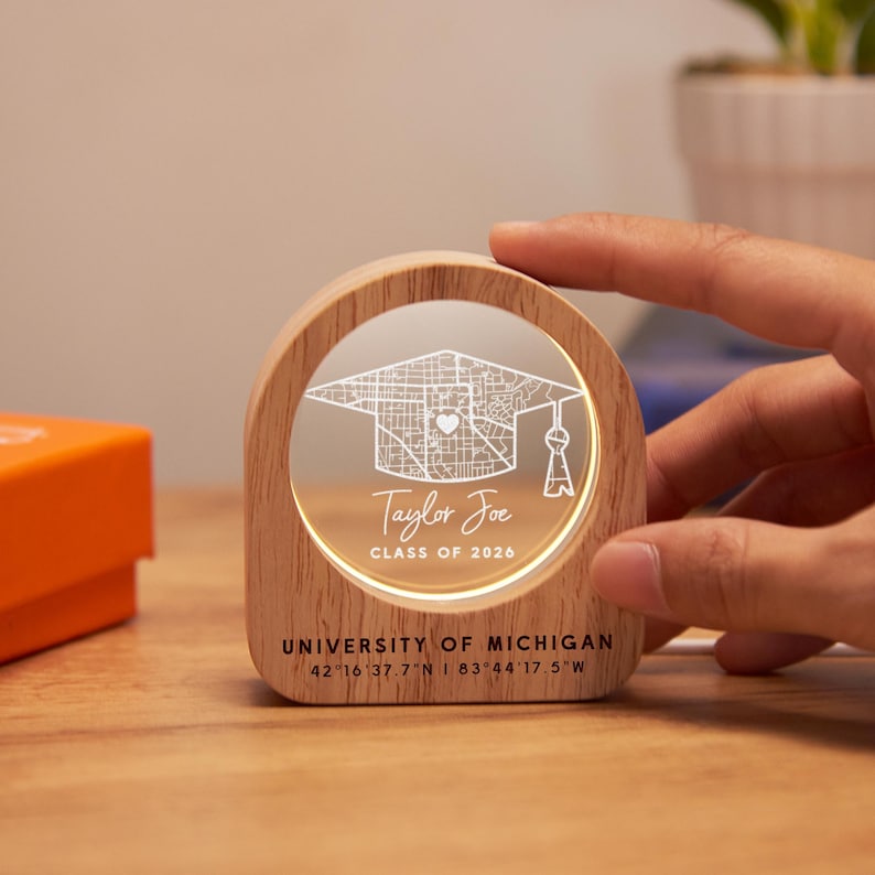 Customized engraved night light for the Class of 2026, featuring high-end crystal craftsmanship.