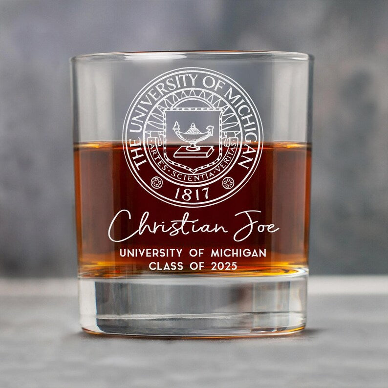 This custom etched whiskey glass features a detailed college map, making it a perfect memento for new grads.