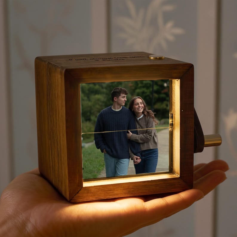 This custom flipbook, a Personalized Couple Photo Wooden Flipbook with Light, makes a thoughtful Valentine's gift for her.