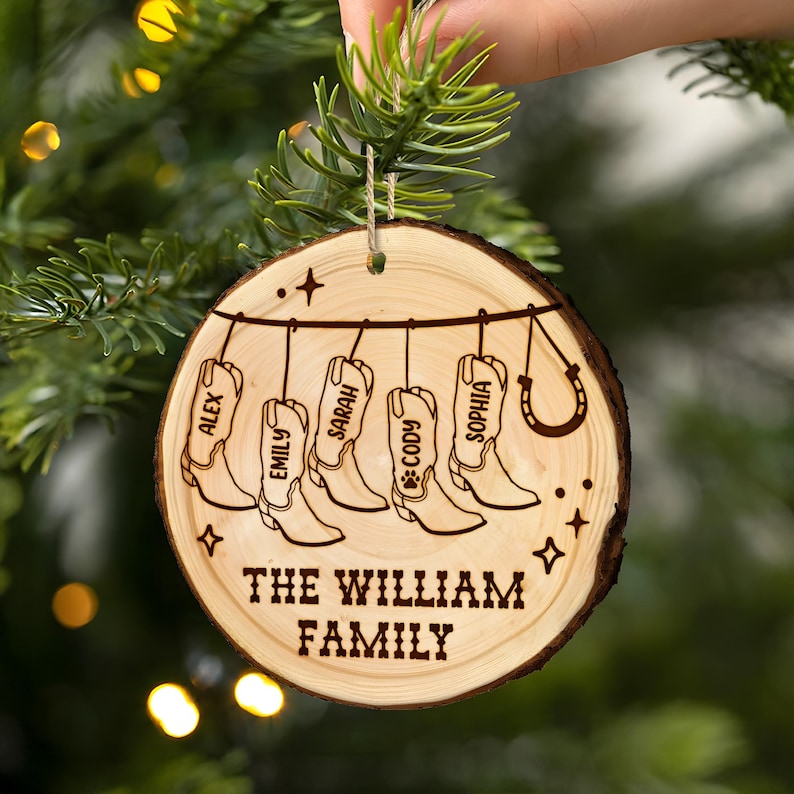 A close-up of an engraved Personalized Cowboy Christmas Wooden Ornament, a charming family ornament and one of the best cowboy gifts.