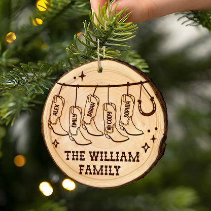 A close-up of an engraved Personalized Cowboy Christmas Wooden Ornament, a charming family ornament and one of the best cowboy gifts.