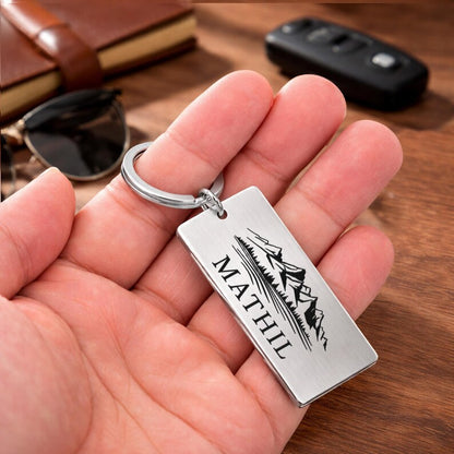 Engraved key ring and personalized keychain for grandpa, making it a cool custom dad keychain from the grandkids.