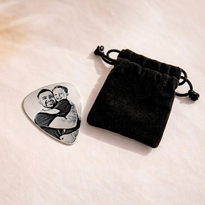 This custom guitar pick features a cherished family photo, making it a unique gift for dad.