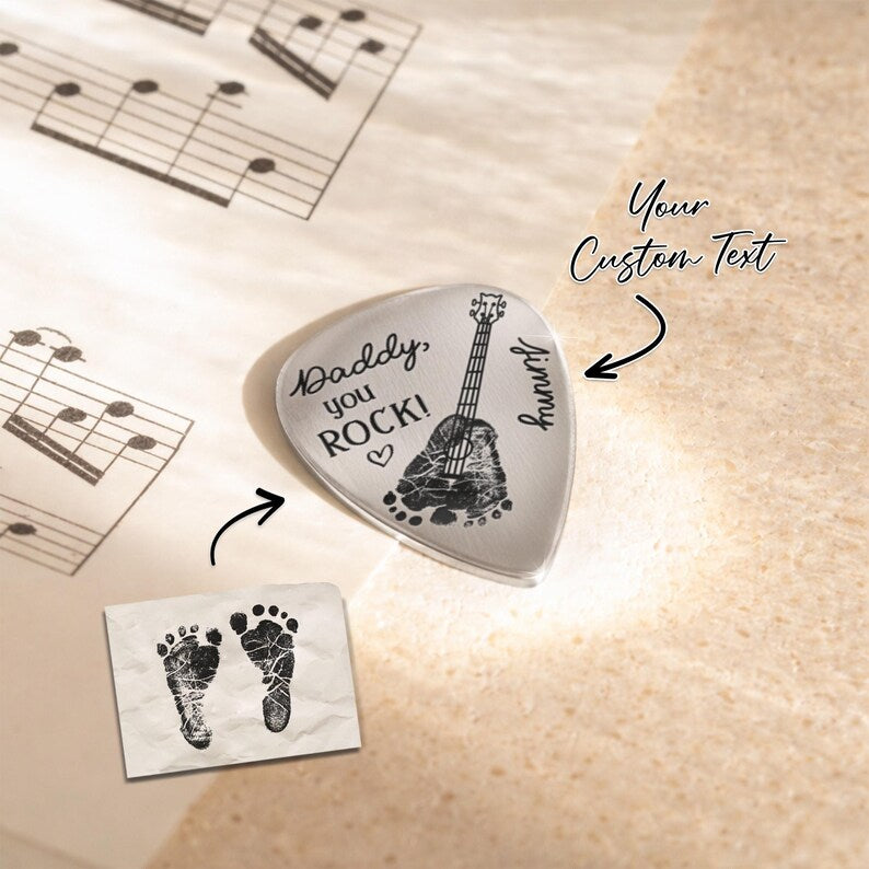 The perfect gift for first time dads, offering a sentimental and functional touch for his guitar music.
