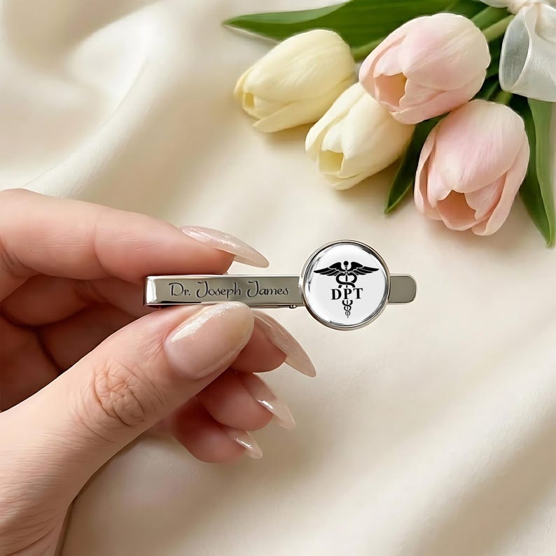 Customized graduation tie clip, offering a personal touch to your professional physical therapy attire.