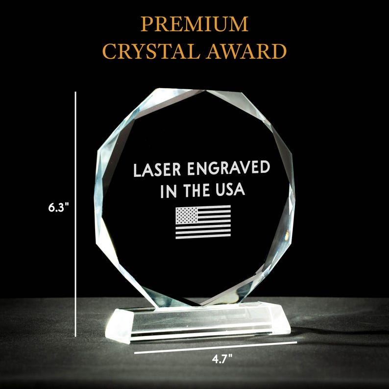 A close-up of an engraved crystal award, the Personalized Employee Long Service Crystal Award is a premium custom corporate gift.