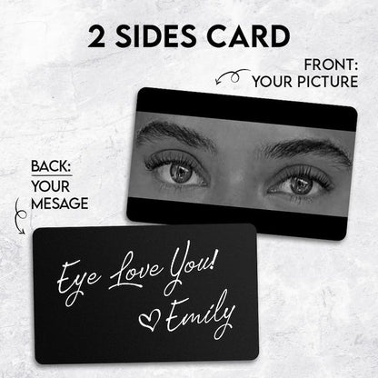 A close-up of a personalized metal wallet card, the Personalized Eyes Photo Card is a creative engraved Valentine's day gift.
