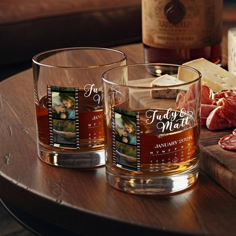 A close-up of a custom bourbon glass with a personalized film strip design for unique custom whiskey glasses.