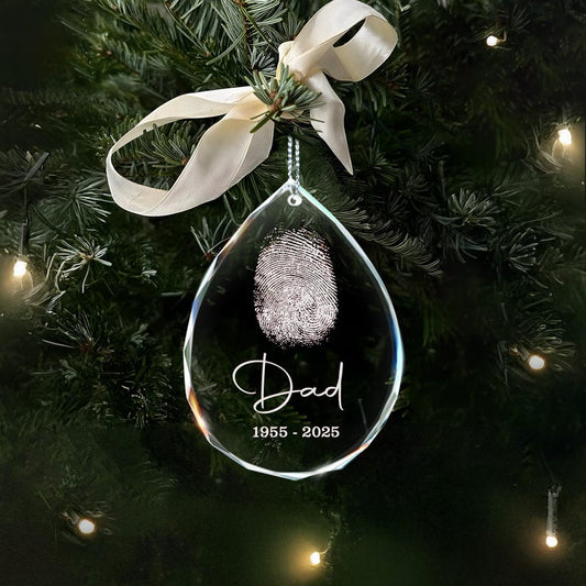 A Personalized Fingerprint Dad Remembrance Teardrop Glass Ornament, a touching sympathy gift for the loss of a father.