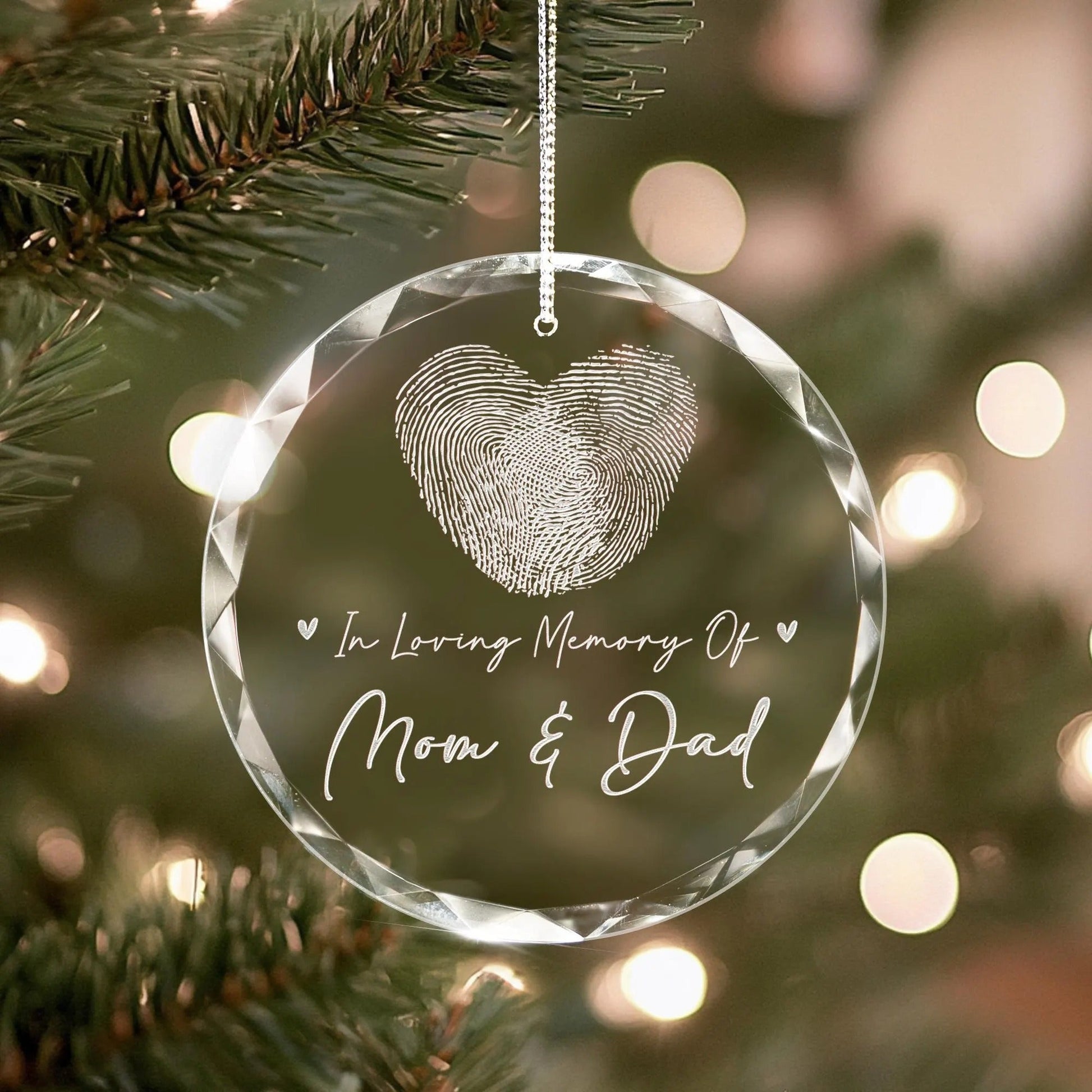 Customized memorial Christmas ornaments featuring fingerprint and remembrance message  