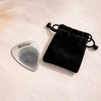 This custom guitar pick features a unique thumbprint, making it a special Father's Day gift.