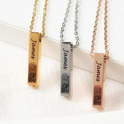 A close-up of the engraved Personalized Fingerprint Urn Bar Necklace, a thoughtful sympathy gift for loss of father.