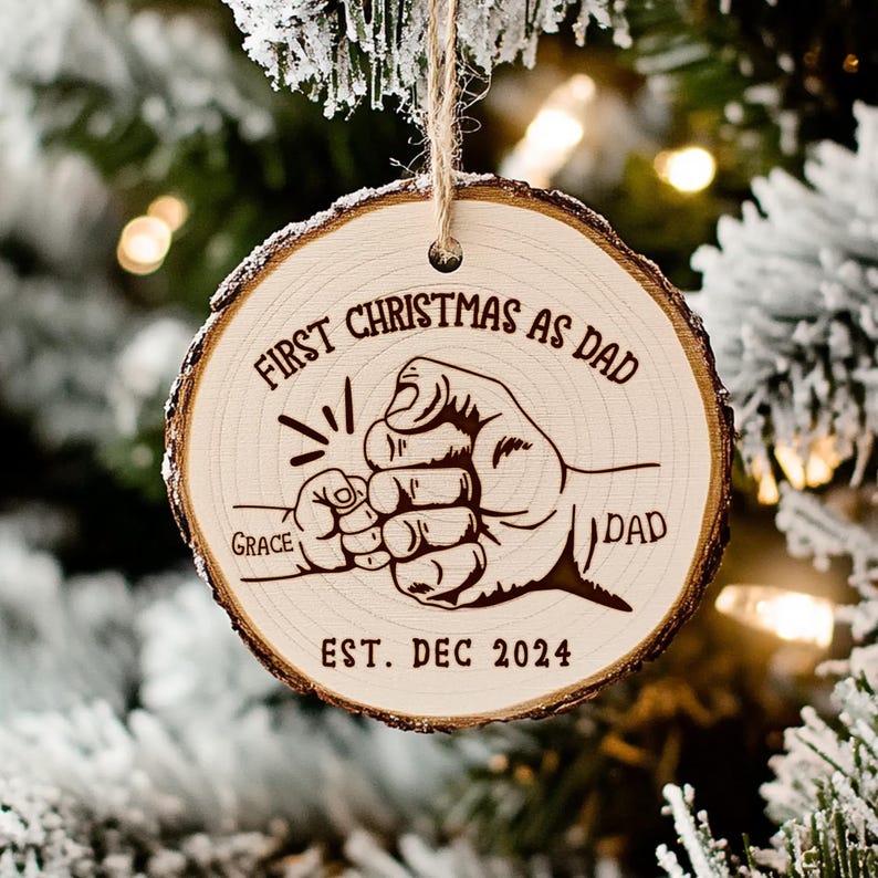 This personalized wooden ornament, a Personalized First Christmas As Dad Wooden Ornament, is a cherished keepsake for a new dad.
