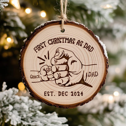 A custom personalized wooden ornament marking a 'First Christmas As Dad', one of the best gifts for new dads this holiday season.