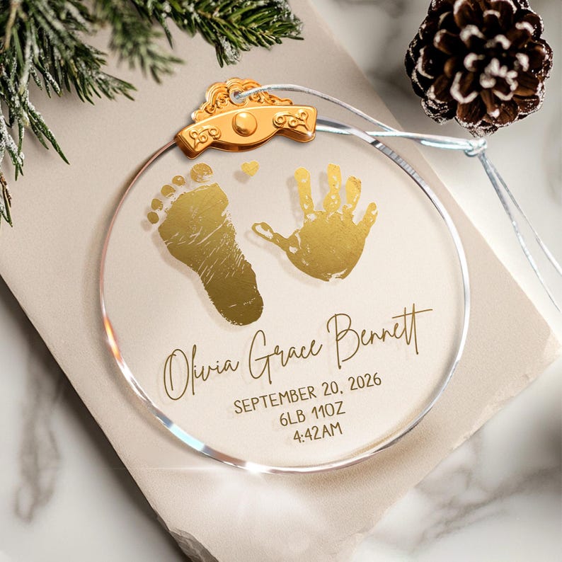 Close-up of a personalized glass ornament, the Personalized First Christmas Glass Ornament is a cherished first Christmas ornament keepsake.