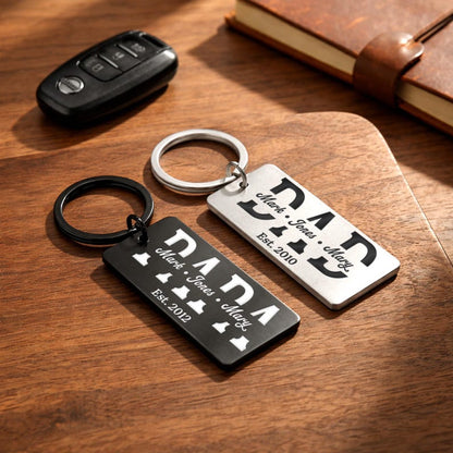 Custom metal keychains featuring a laser engraved keychain design, the perfect first Fathers Day gifts for a new dad.