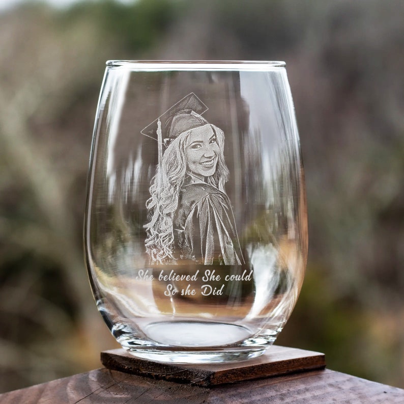 This custom photo wine glass features high-quality engraving, making it a perfect memento for new graduates.