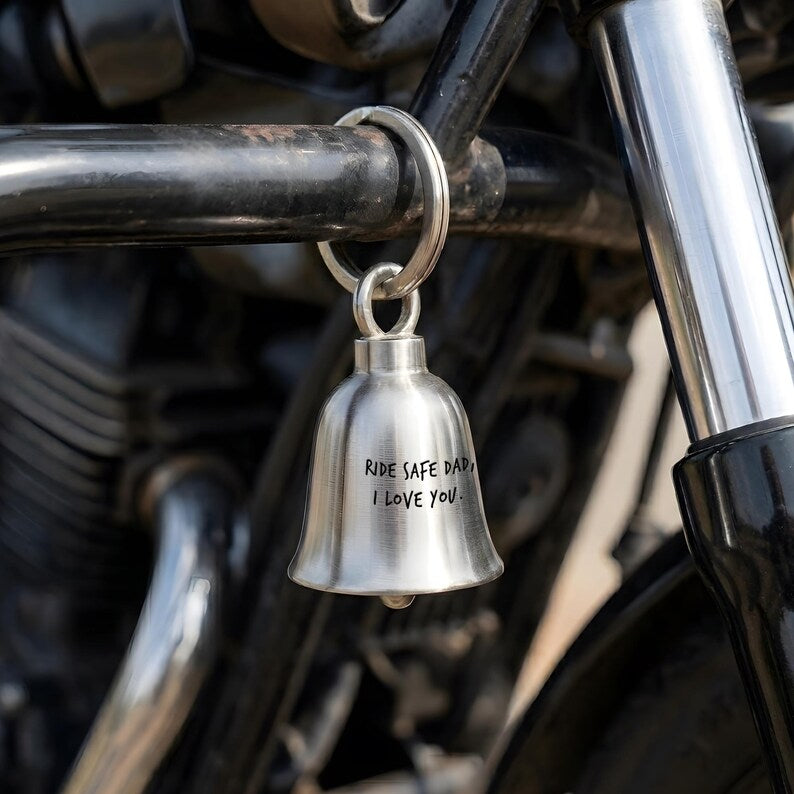 Custom engraved gremlin bells featuring a unique handwriting style, perfect for biker dads for Father's Day 2026.
