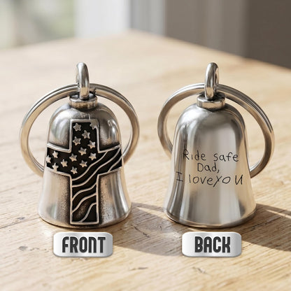Custom engraved motorcycle guardian bell featuring a USA flag cross guardian bell design and handwriting engraving.