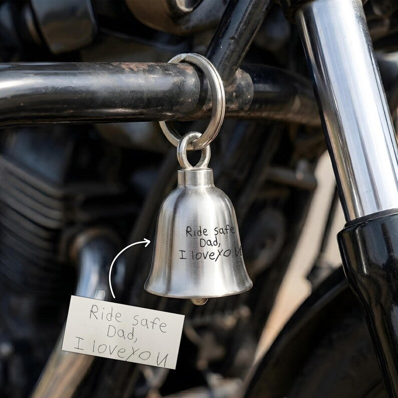 Custom gremlin bells with an American us flag cross guardian bell motif, a perfect engraved Father's Day gift for 2026.
