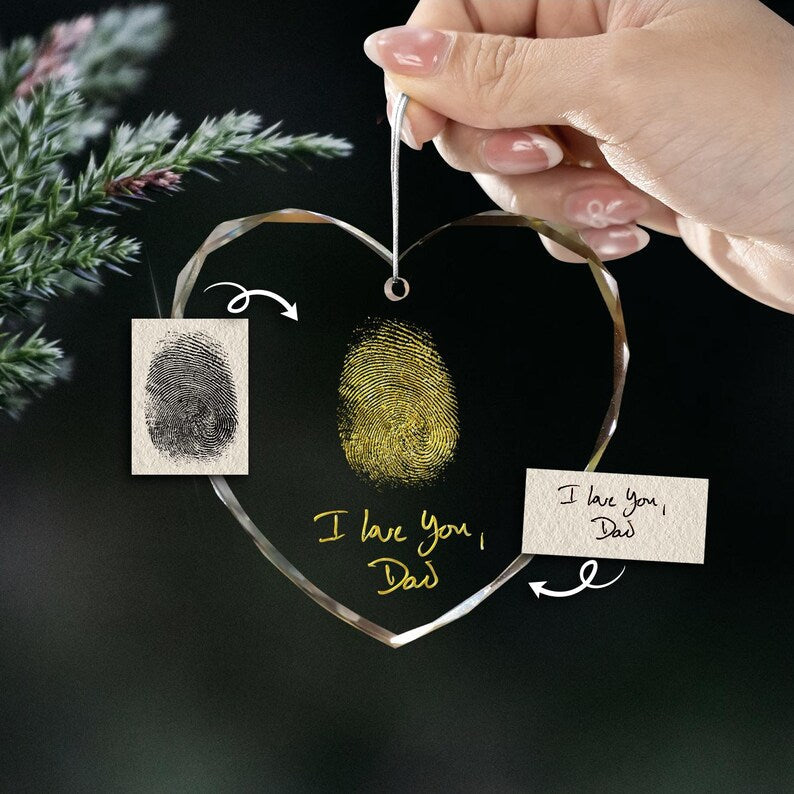 This custom memorial ornament, a Personalized Handwritten & Fingerprint Teardrop Glass Ornament, features a unique handwriting engraving.
