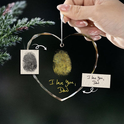 This custom memorial ornament, a Personalized Handwritten & Fingerprint Teardrop Glass Ornament, features a unique handwriting engraving.