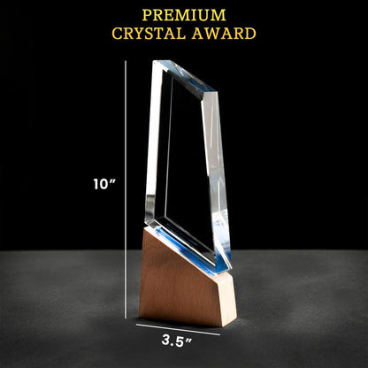 A close-up of an engraved crystal award, the Personalized Happy Retirement Crystal Award is a premium custom corporate gift.