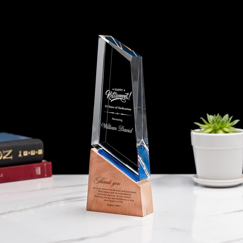 The perfect retirement tribute, this crystal trophy is a sophisticated choice for award gifts for employees and colleagues.