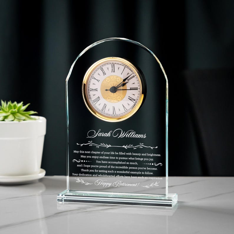 Happy Retirement Engraved Glass Clock, a crystal desk clock and perfect retirement clock gift for staff.